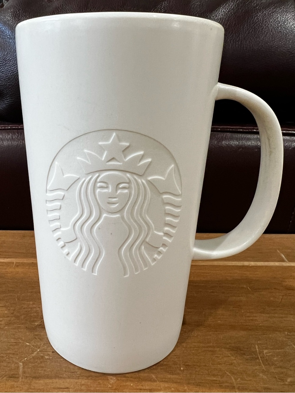 Starbucks tall White Ceramic Coffee Mug with etched Siren. 2014 holds 16oz.